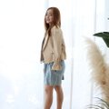 Model wearing Designer Inspired Jacket-Beige Full Left View