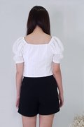 Model wearing Textured Puffy Sleeves Top-White Back View
