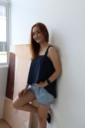 Model wearing Spaghetti Hi-Lo Top-Navy Blue Left View 2