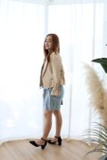 Model wearing Designer Inspired Jacket-Beige Full Left View