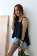 Model wearing Spaghetti Hi-Lo Top-Navy Blue Left View 3